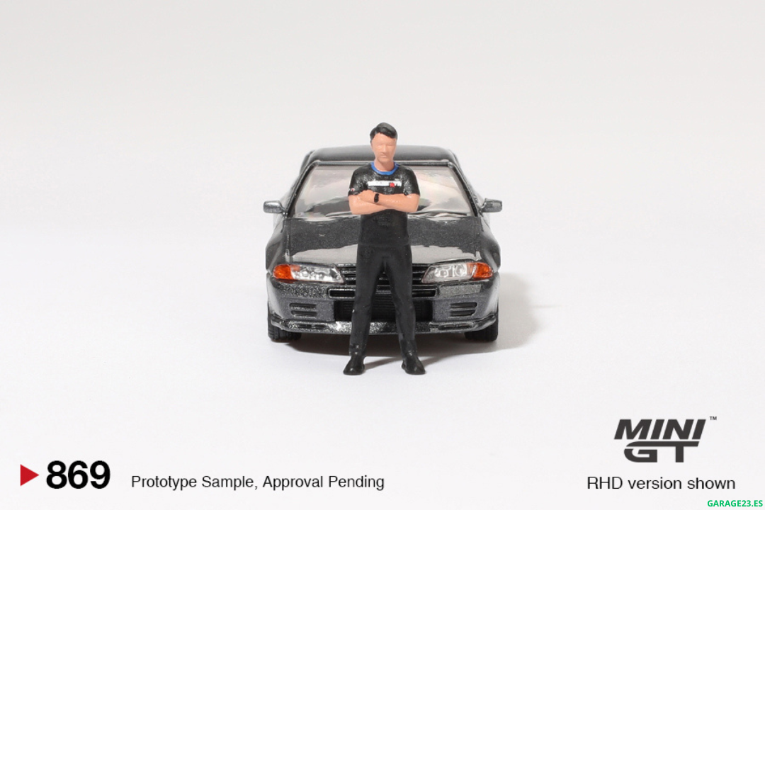 ***EN CAMINO*** MINI GT 1:64 NISSAN SKYLINE GTR R32 NISMO NISMO GUNMETAL CON FIGURA TSUGIO MATSUDA #869