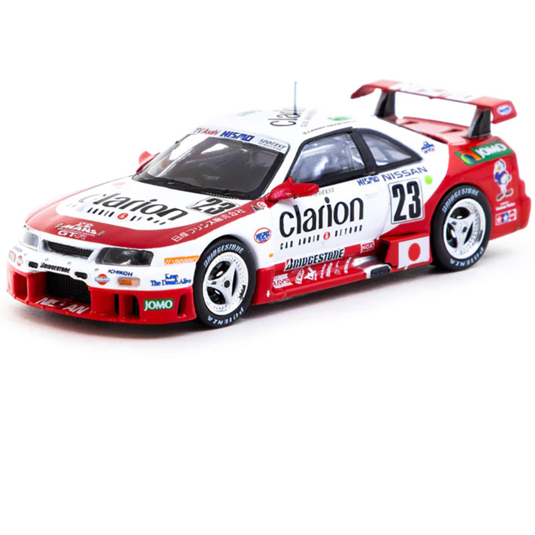 Tarmac Works 1.64 Nissan NISMO GT-R LM de Tarmac Works, 24 Horas de Le Mans 1995. Presentación de K. Hoshino, T. Suzuki y M. Kageyama.