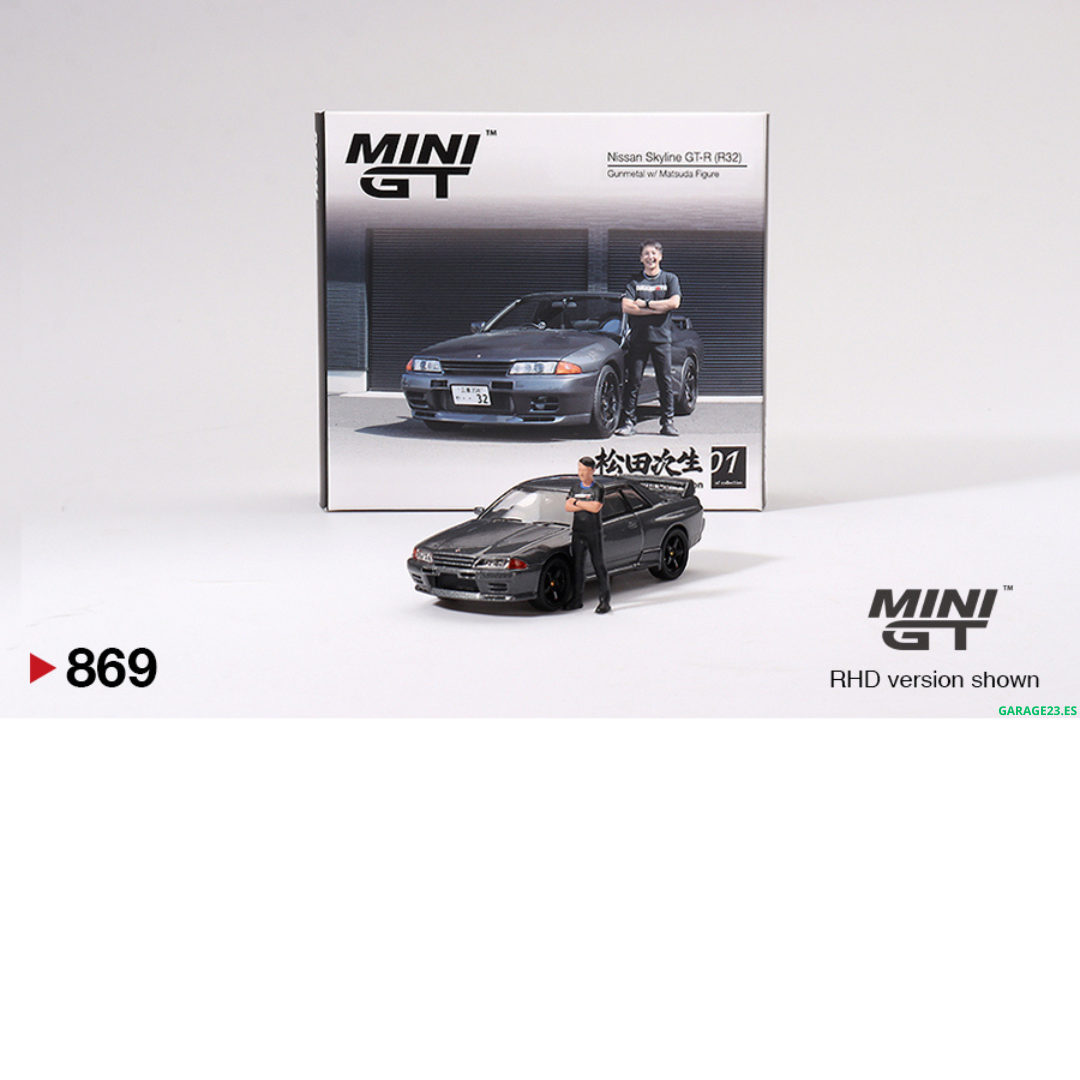***EN CAMINO*** MINI GT 1:64 NISSAN SKYLINE GTR R32 NISMO NISMO GUNMETAL CON FIGURA TSUGIO MATSUDA #869