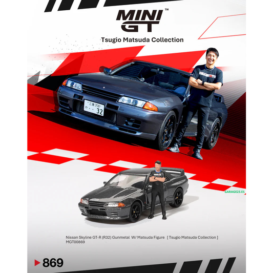 ***EN CAMINO*** MINI GT 1:64 NISSAN SKYLINE GTR R32 NISMO NISMO GUNMETAL CON FIGURA TSUGIO MATSUDA #869